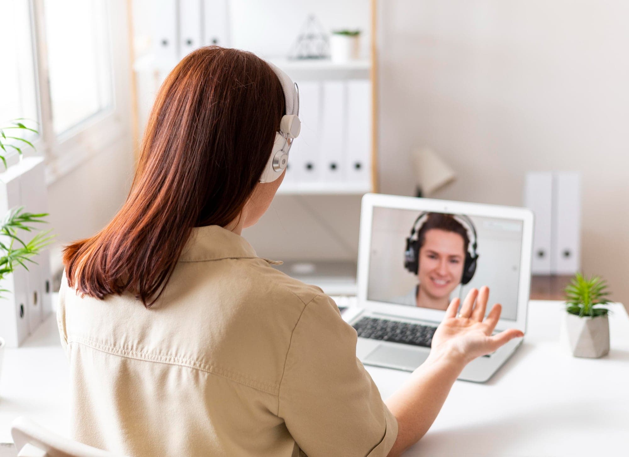 A person attending an online counselling session from the comfort of their home.