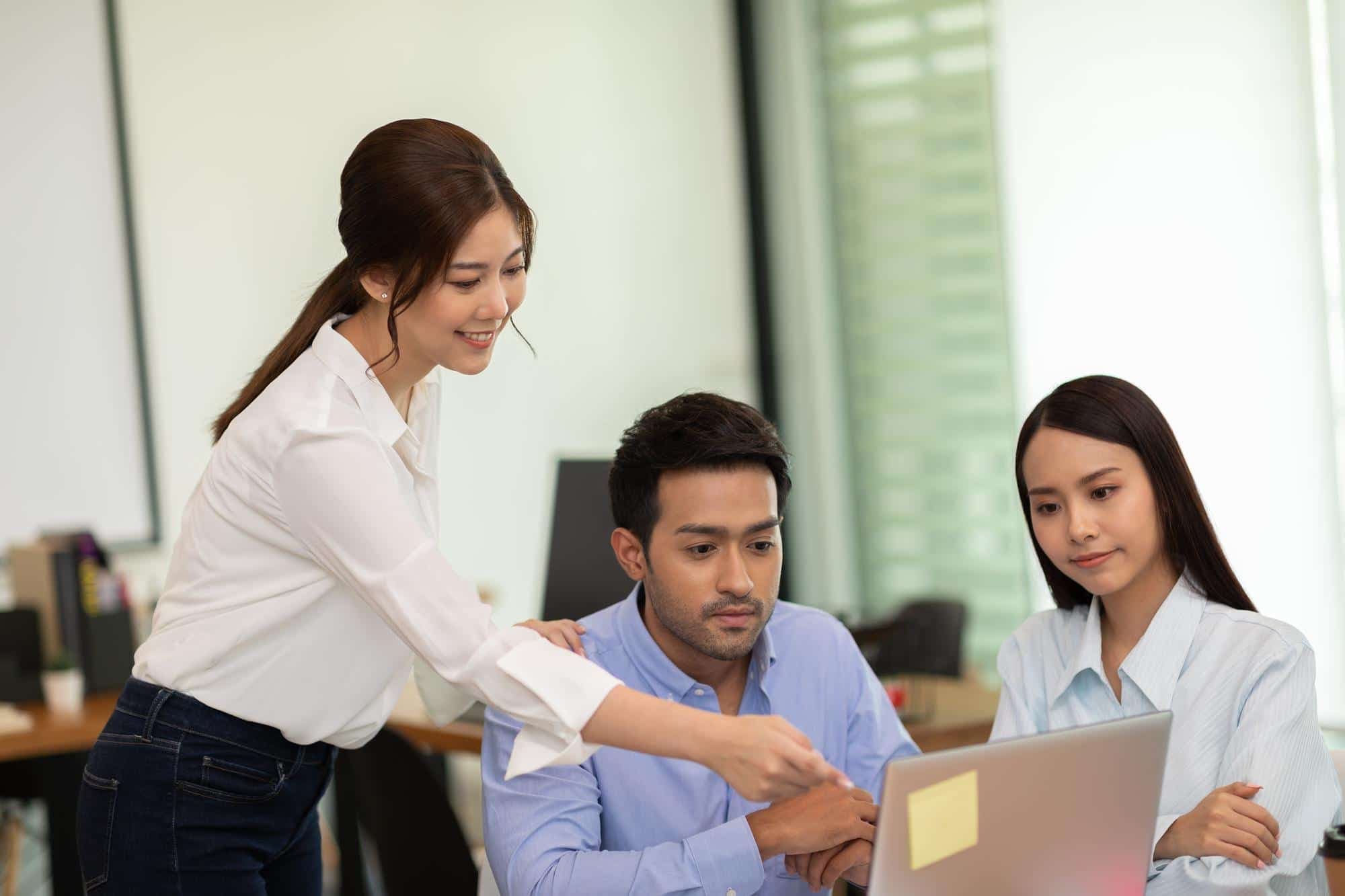 A HR professional explaining the benefits of their Employee Assistance Program to the team.