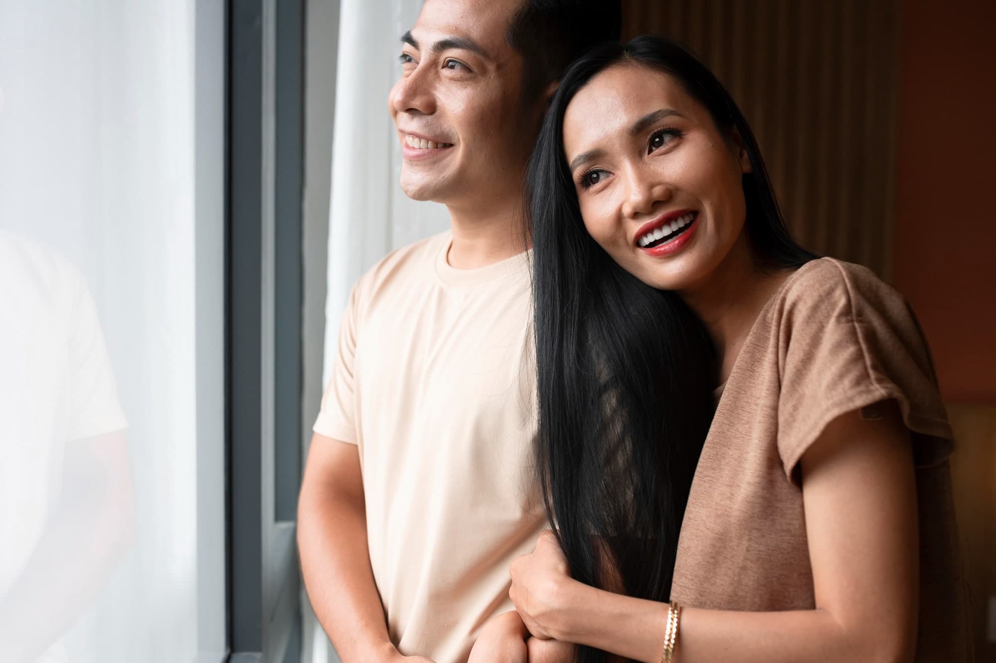 A married couple living happily together after seeking marriage counselling in Singapore.