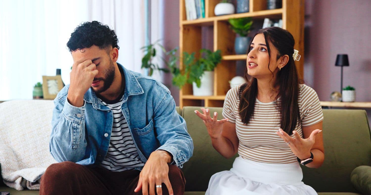 An anxiously attached person seeking reassurance from an avoidant attached partner.