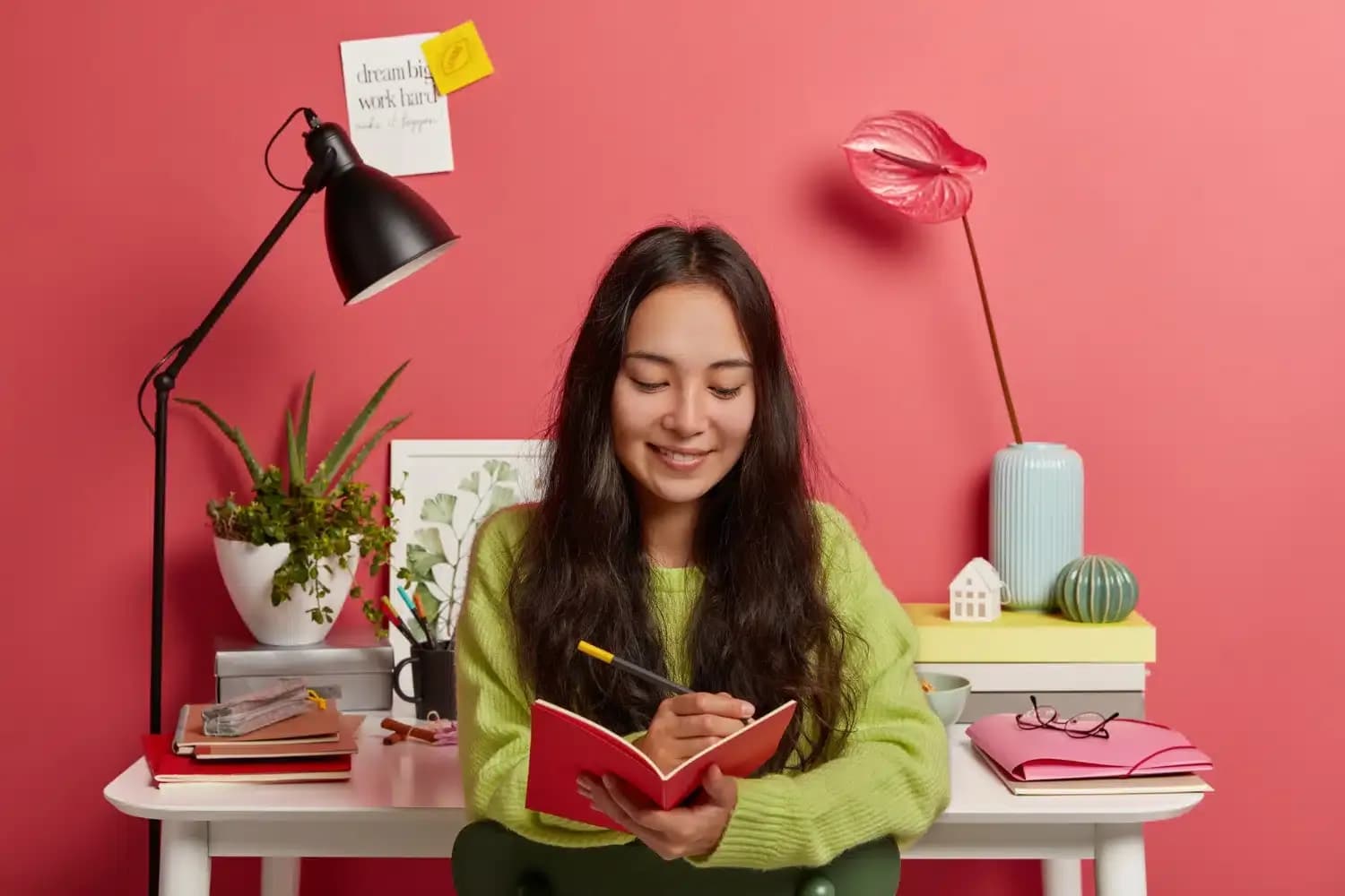 A person journalling on why they want to see a therapist in Singapore.