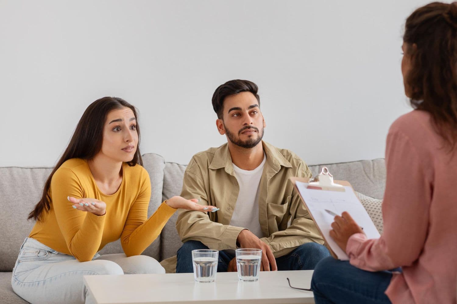 A couple engaging in couples counselling to understand whether their feelings are infatuation vs love.