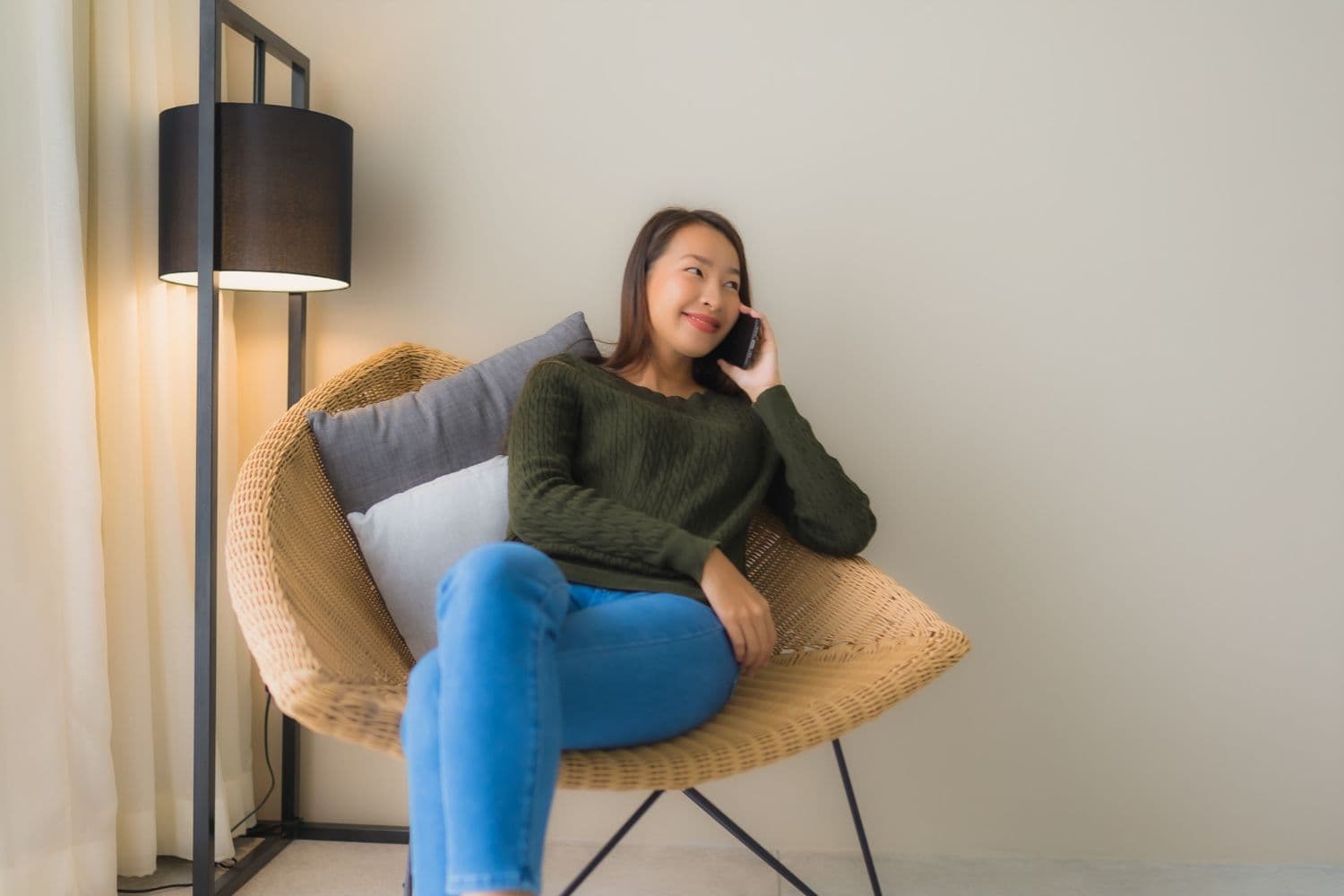 A client talking to a therapist through a safe online therapy audio call from the comfort of their own room.