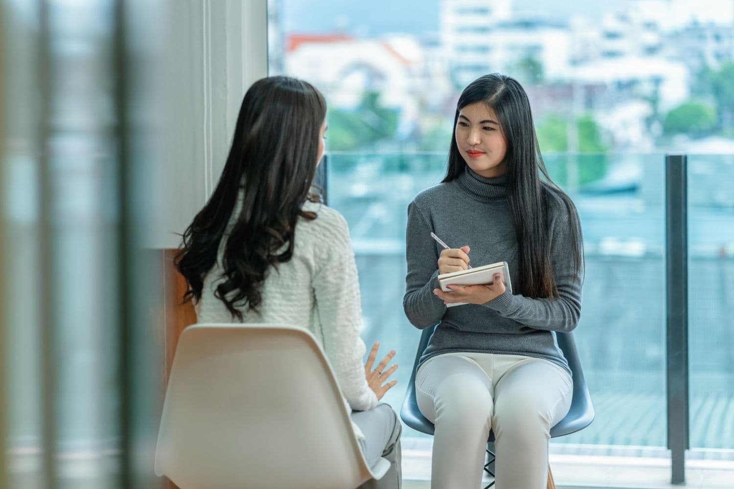 A person engaging in a session with a psychologist in Singapore.