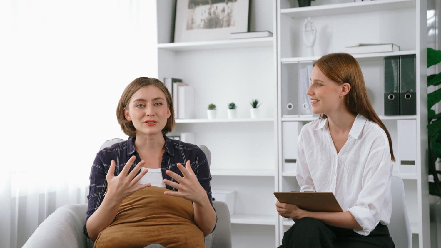 A working professional engaging in therapy for work-life balance in Australia.