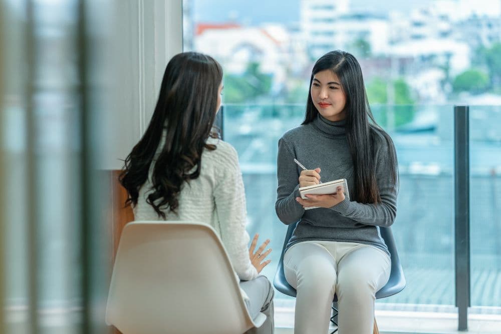 A client and counsellor talking about grief