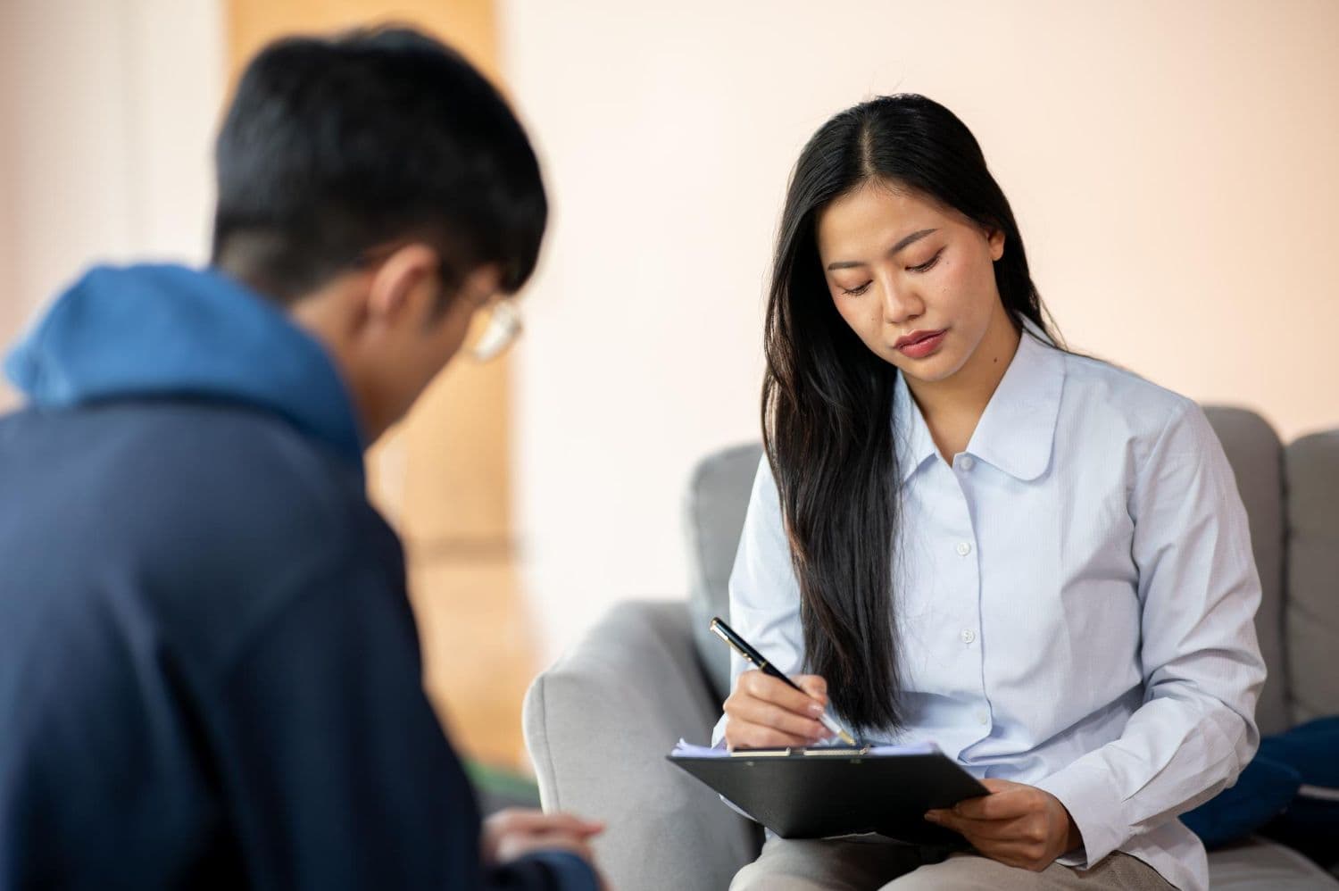 A person engaging in counselling to work on their judgmental personality.