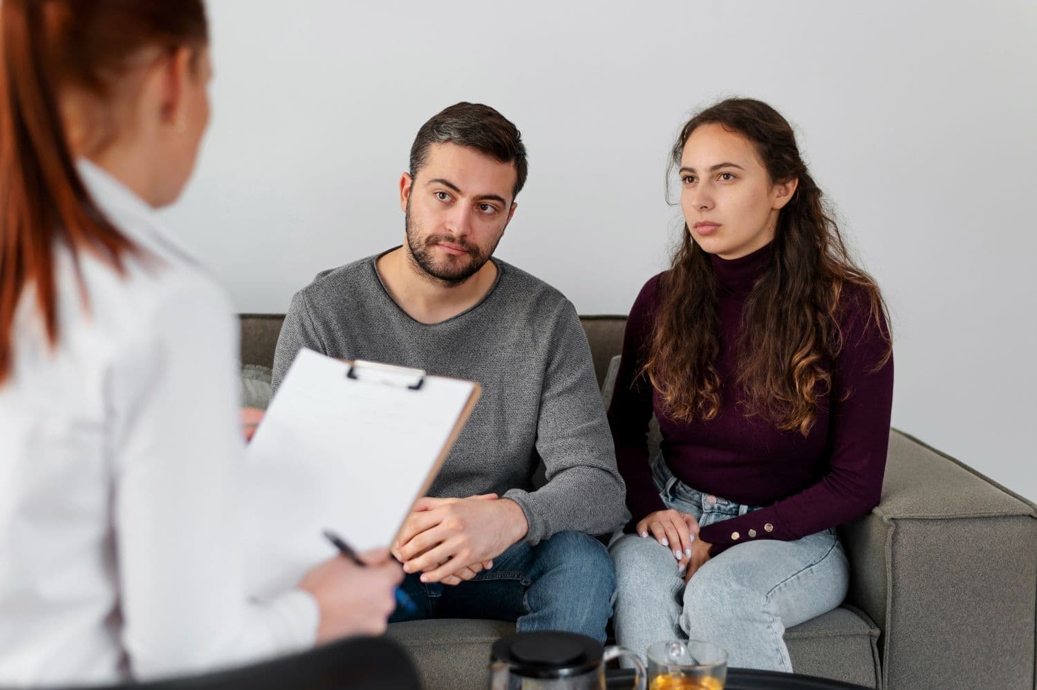 Marriage counselling with two married couples and a counsellor.