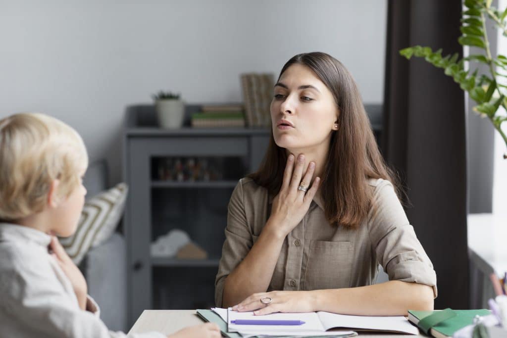 During therapy to manage ADHD symptoms, a therapist is teaching tools to a child.