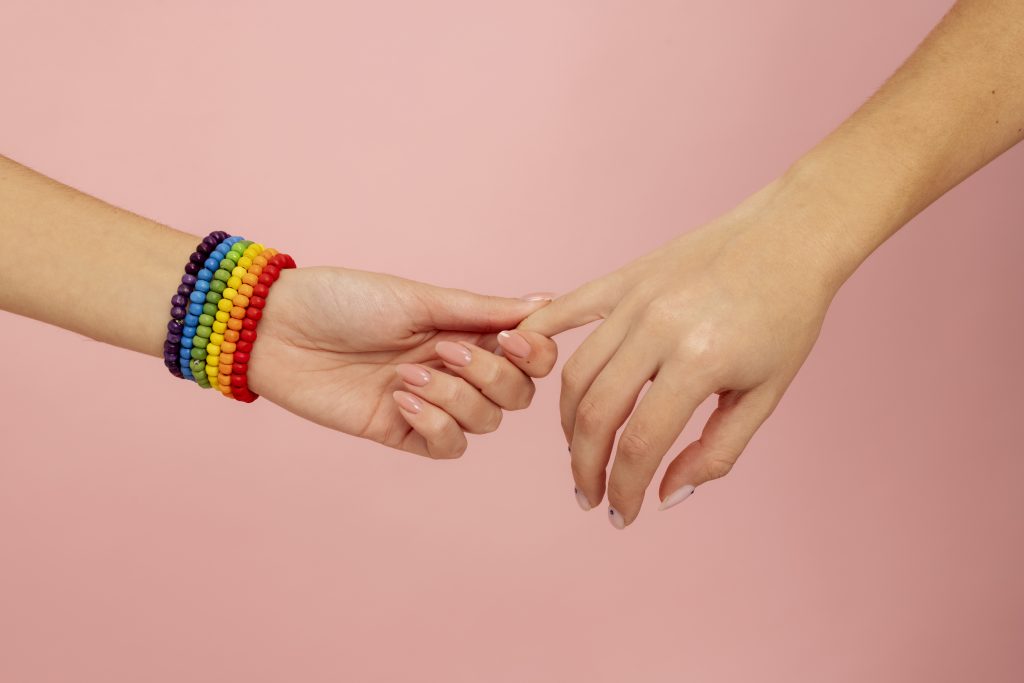 A person holding their partner's hands to build a healthy relationship.