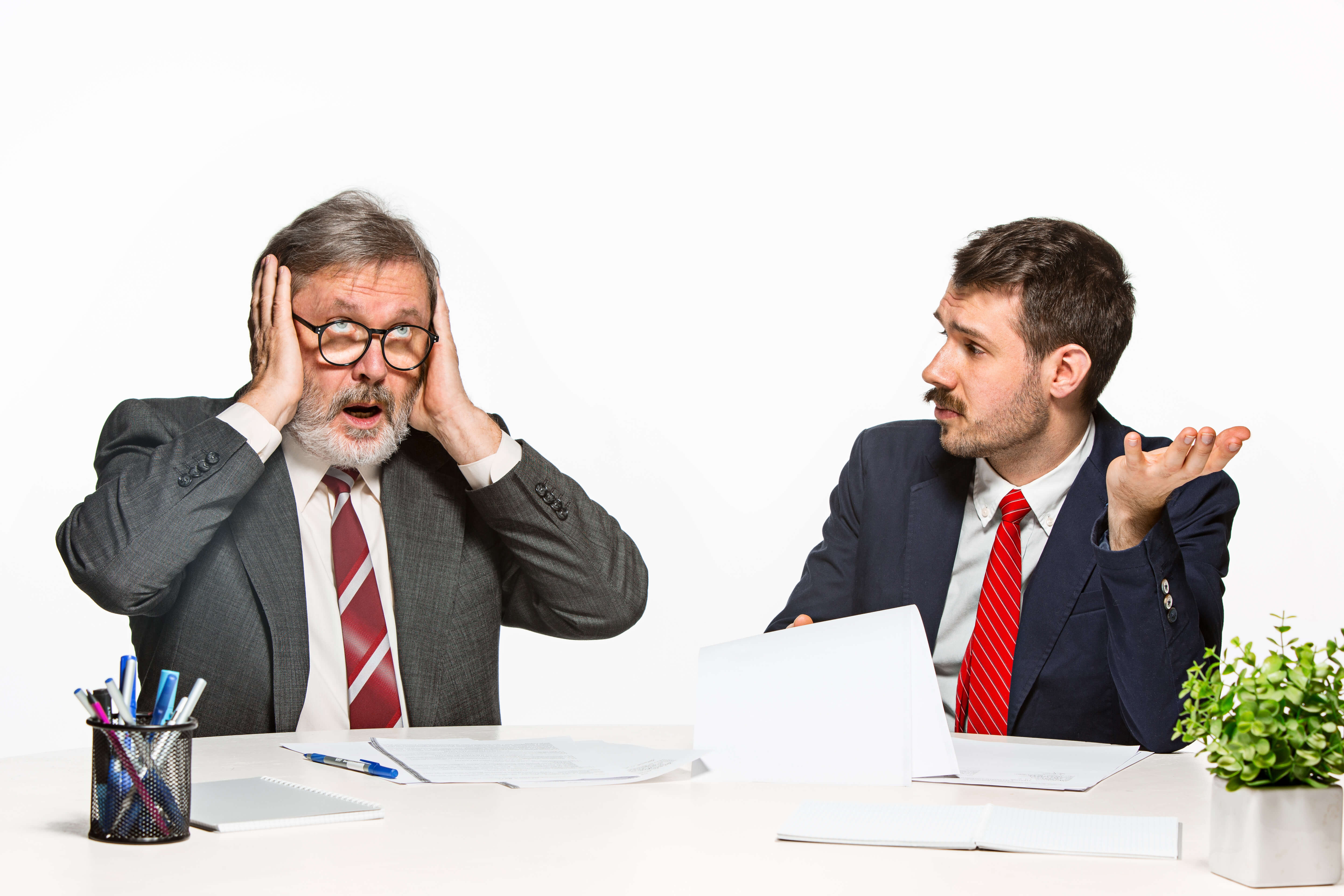 A person throwing a tantrum at work due to adjustment disorder