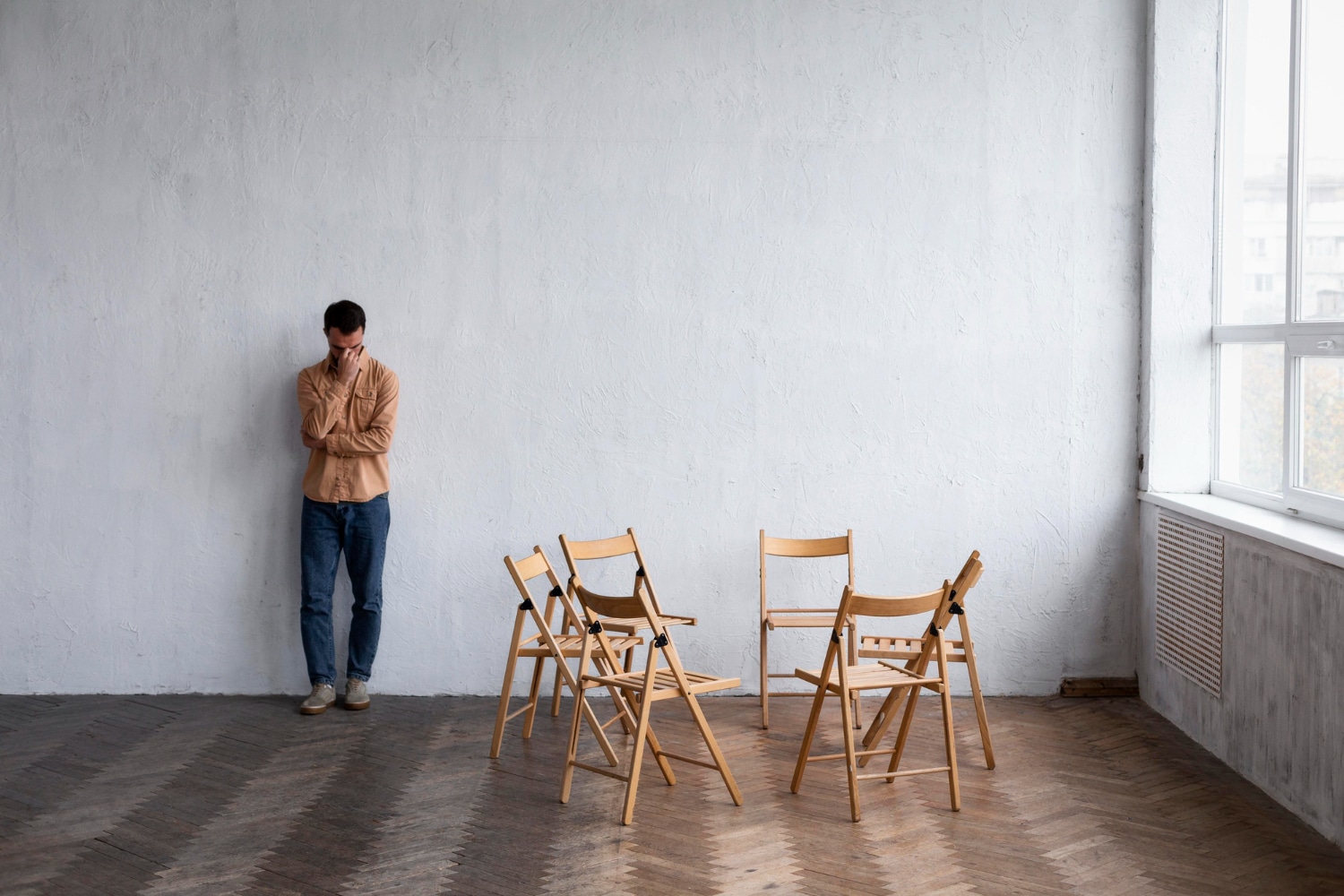 Counsellor using the empty chair technique during a counselling session.