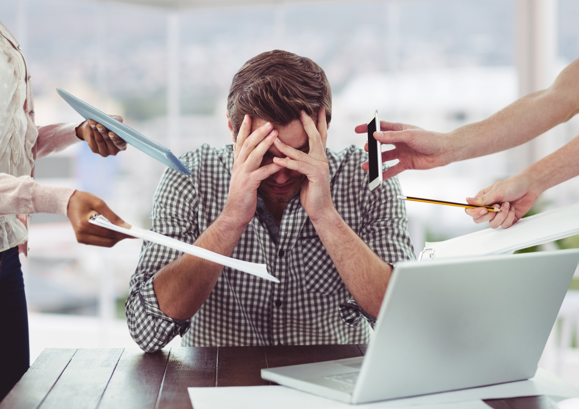 A person showing signs of employee burnout.