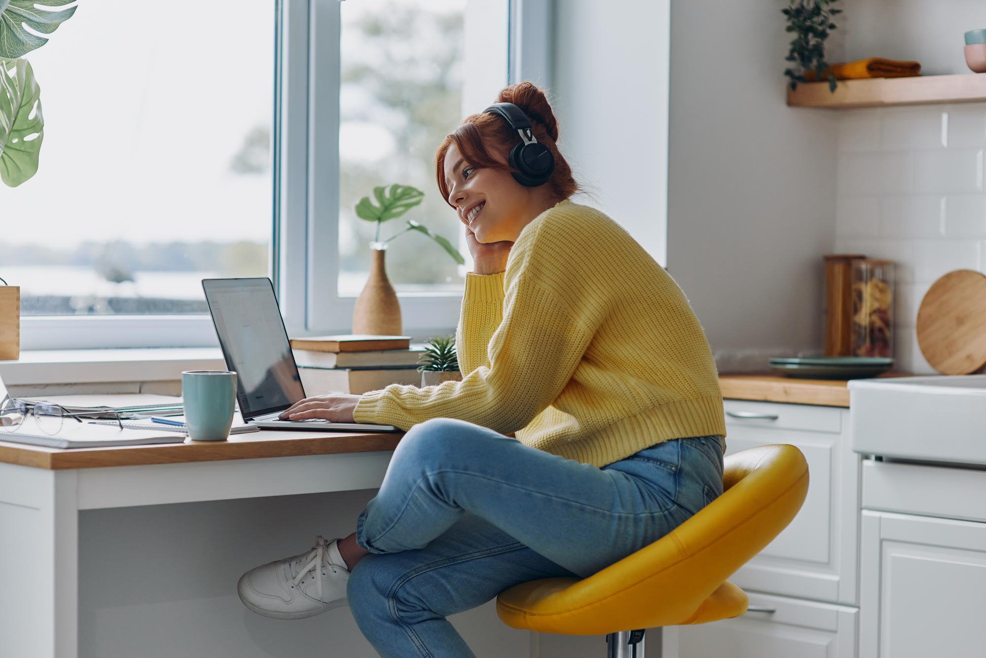 A person engaging in an online therapy session from the comfort of their home.