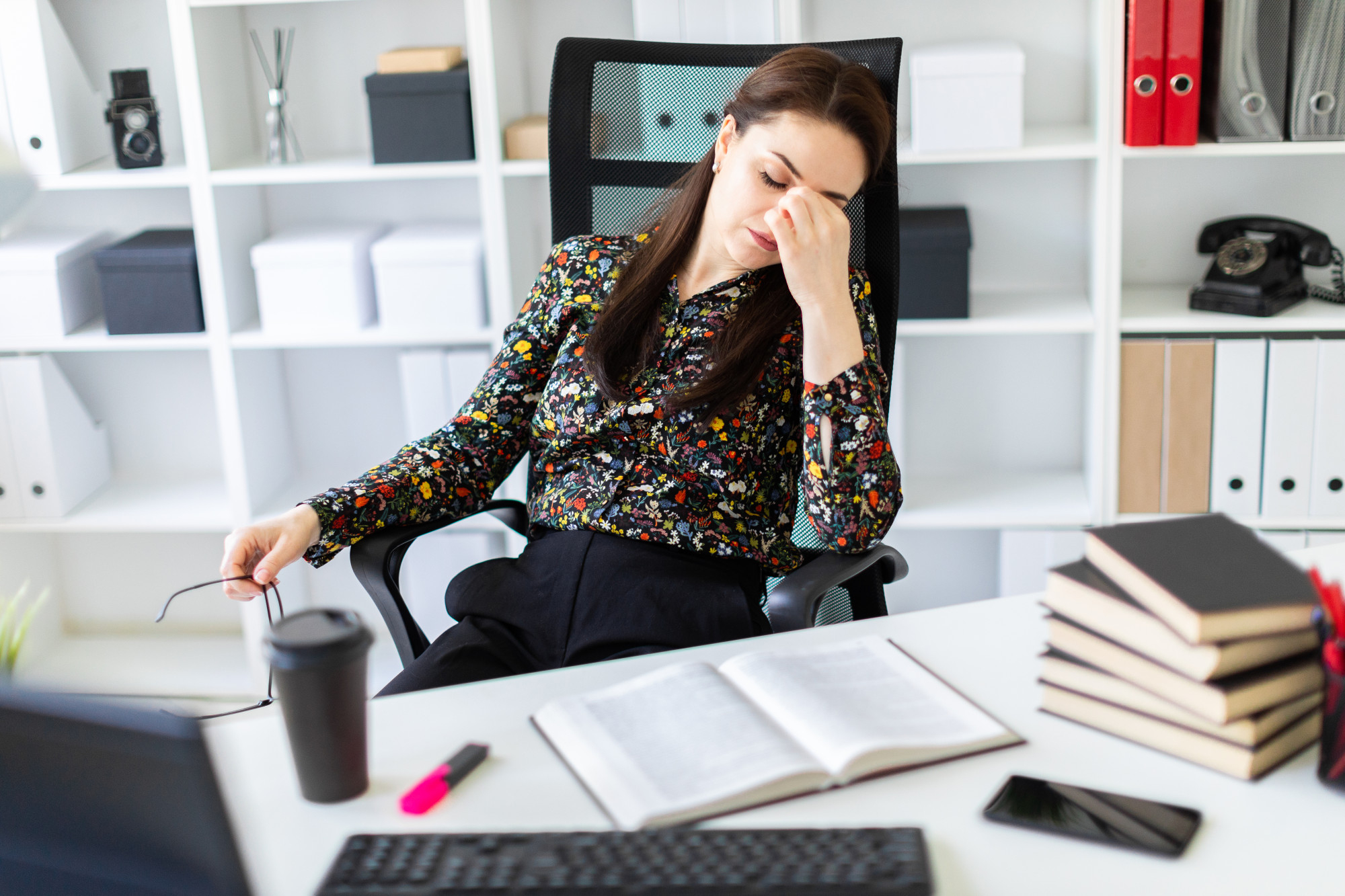 A corporate employee dealing with workplace exhaustion.