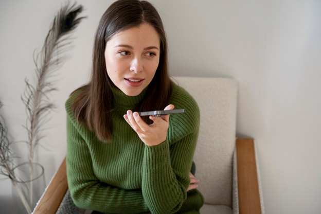 A person engaged in an audio counselling session with their online counsellor.