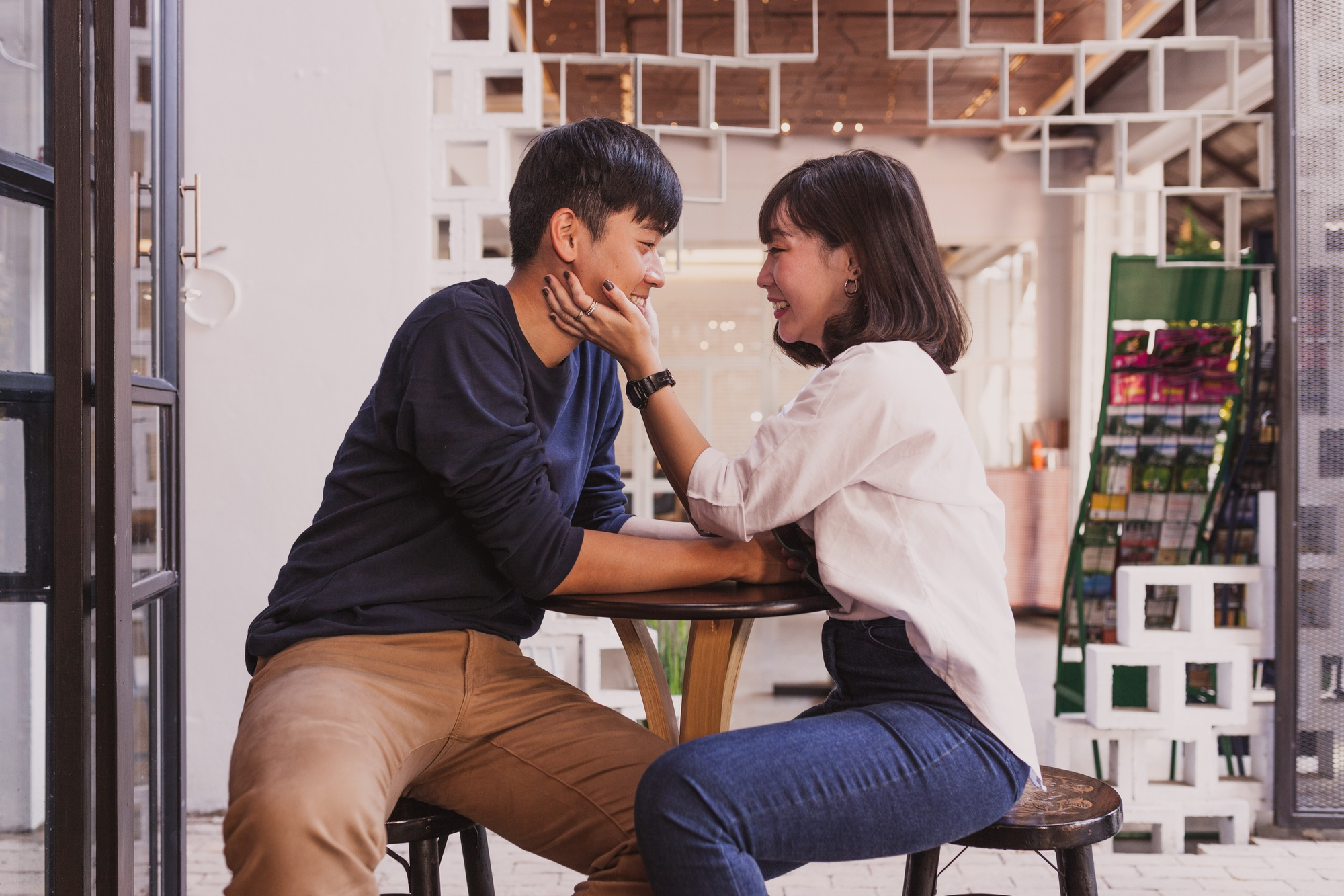 A couple using counselling techniques used in couples therapy sessions in Singapore.