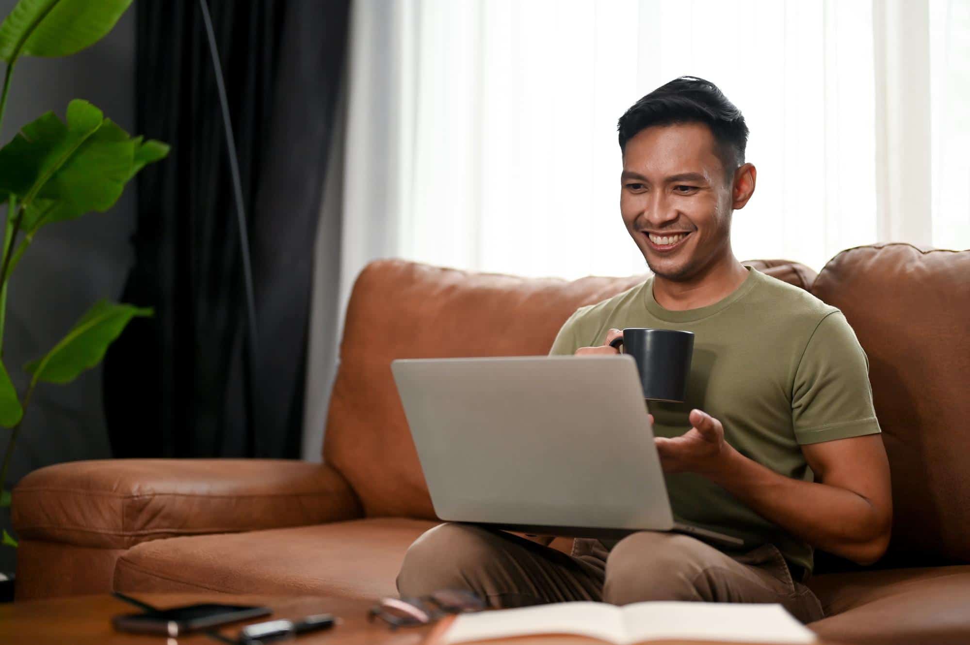 A person talking to their therapist in Singapore from the comfort of their home.