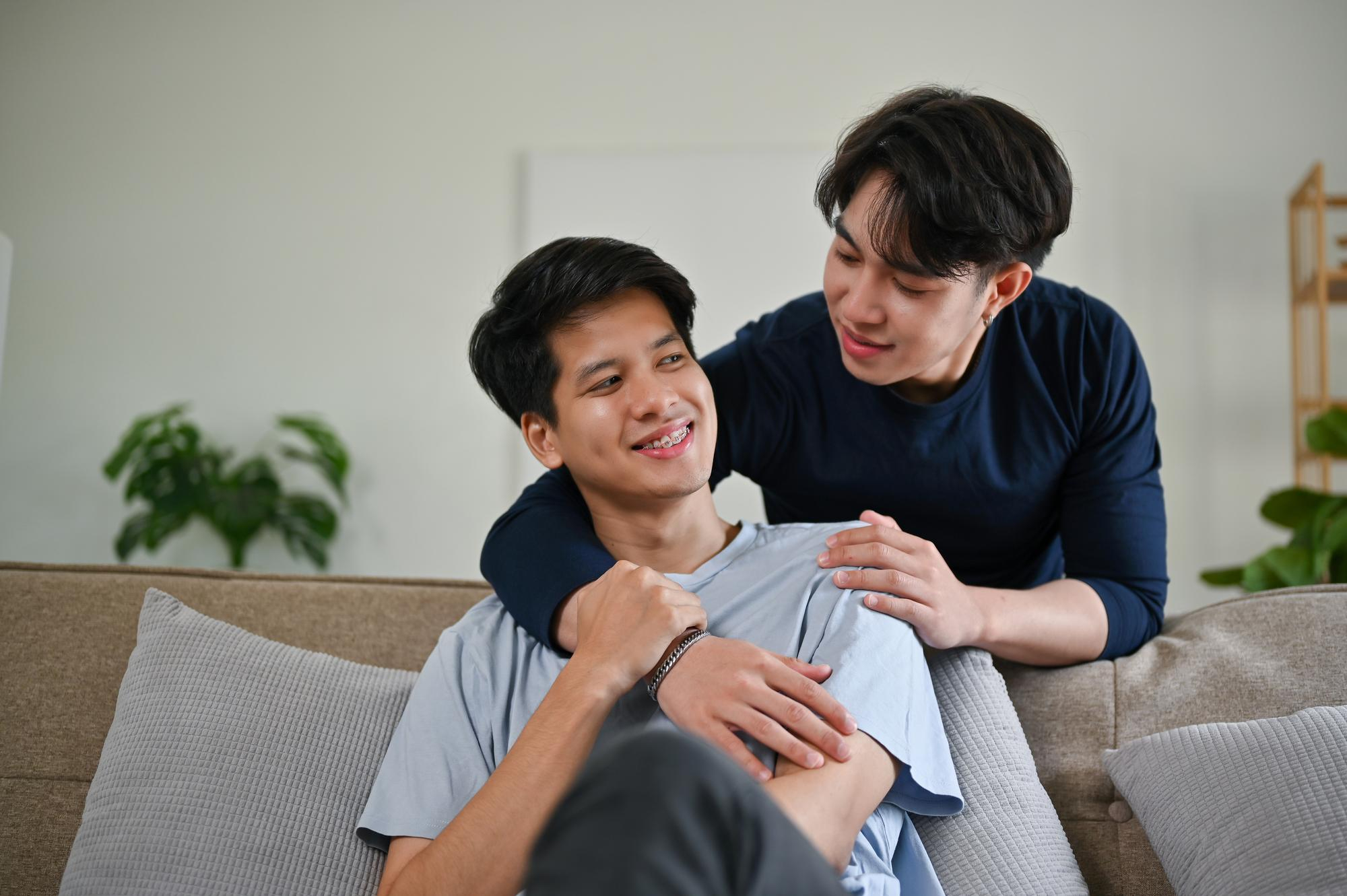 A person encourages their loved one to talk to a therapist in Singapore.