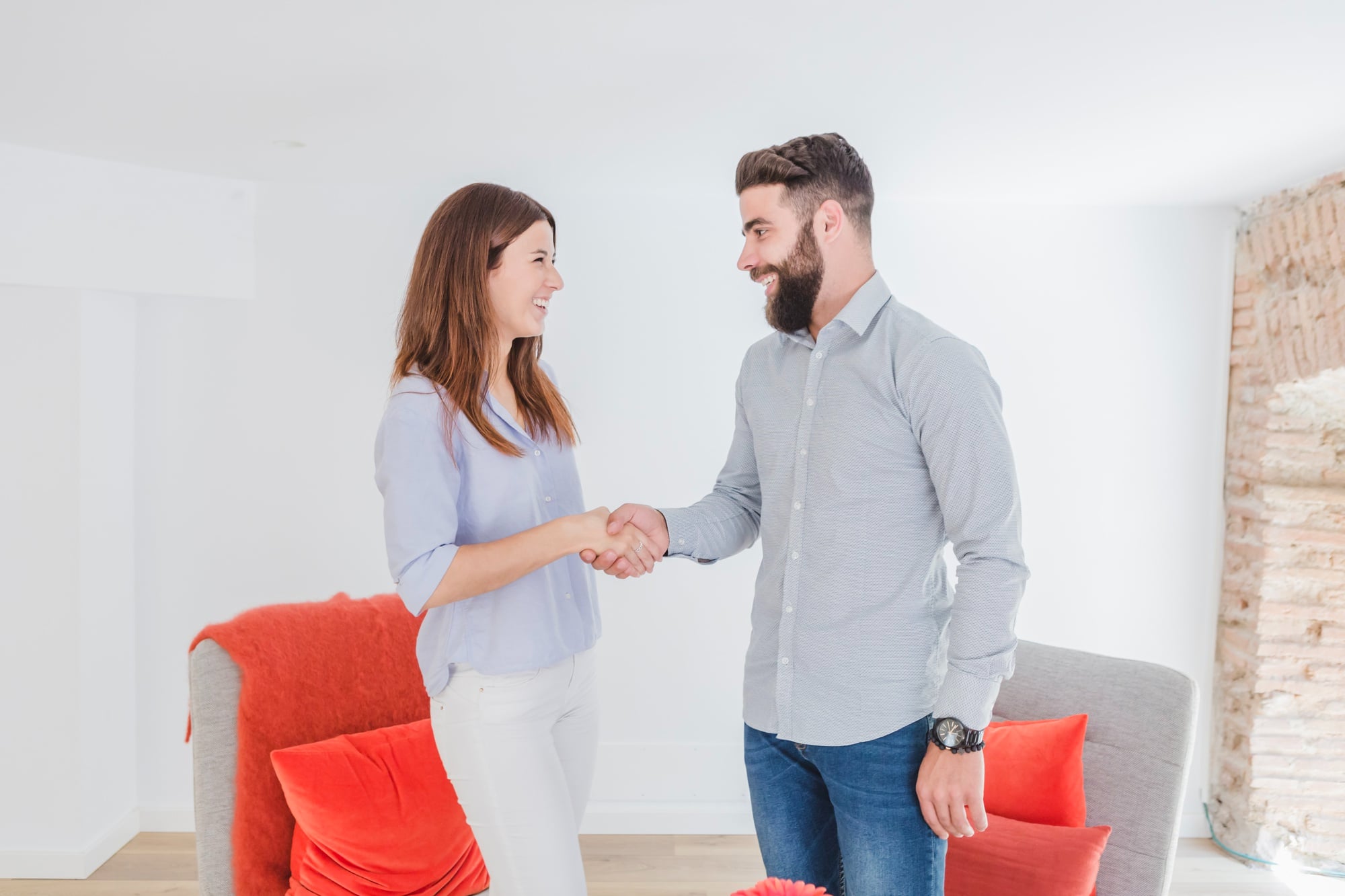 A mental health professional saying hi to a client during therapy.