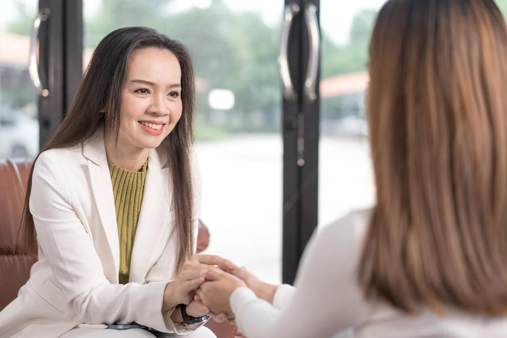 A therapist in Singapore and client during a talk therapy session.